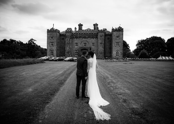 Bride and Groom outside Castle