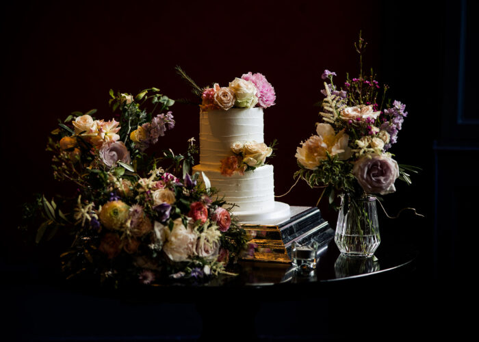 Wedding cake topped with fresh flowers
