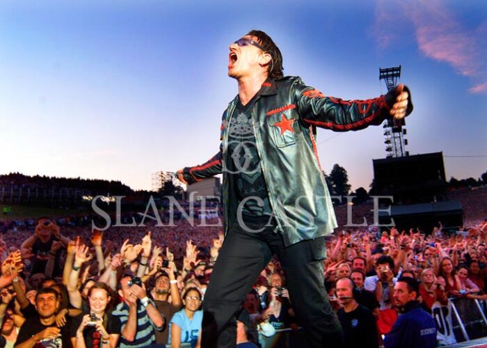 Bono singing on stage Slane Castle