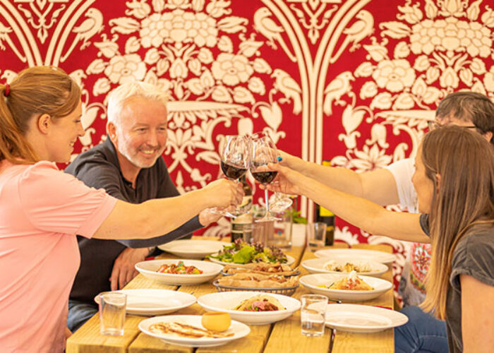 A family toasting and having a meal in Slane Castle