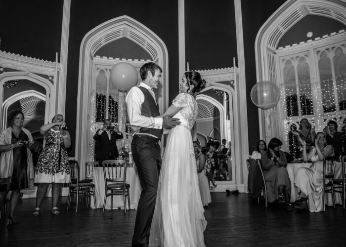 A happy wedding couple first dance