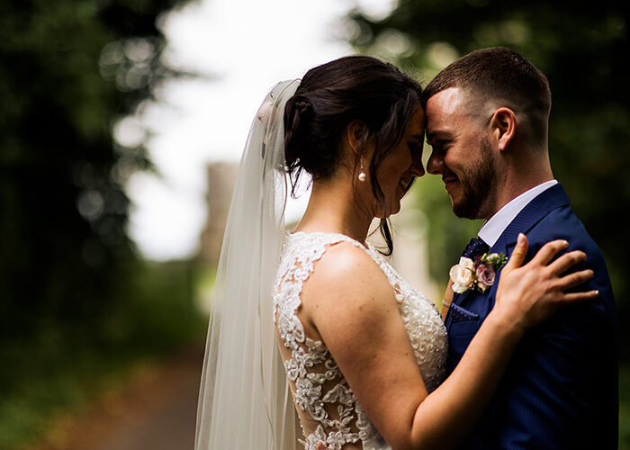 Wedding couple looking into each others eyes