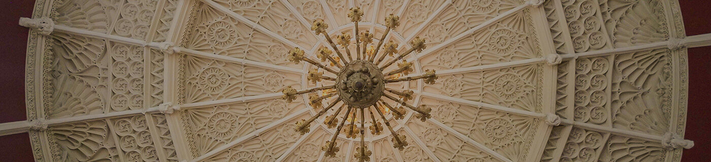 A beautiful plastered ceiling with chandelier