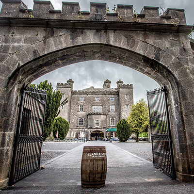 Open gateway with courtyard and Slane Castle