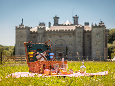 A picnic basked outside Slane Castle in the sunshine