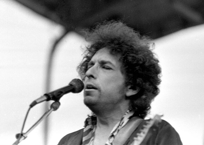 Bob Dylan singing on stage