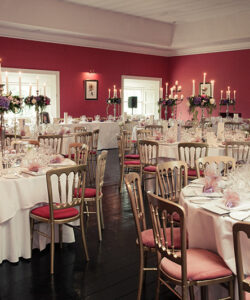 A room wtih table and chairs ready for an event