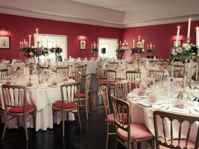 A room wtih table and chairs ready for an event