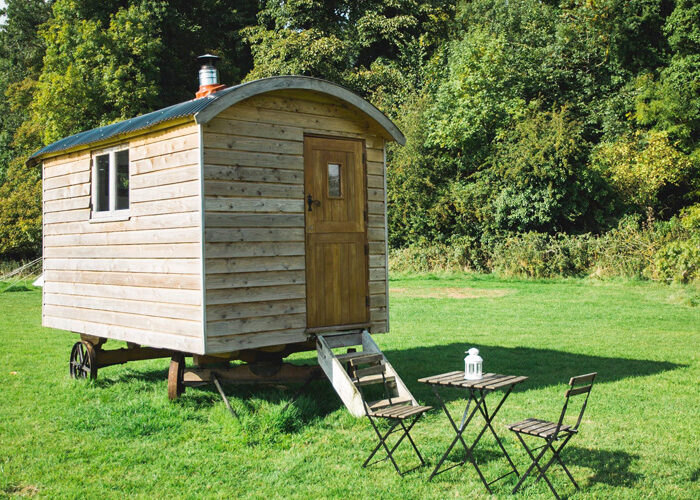 A small caravan with table and chairs at Rock Farm Slane