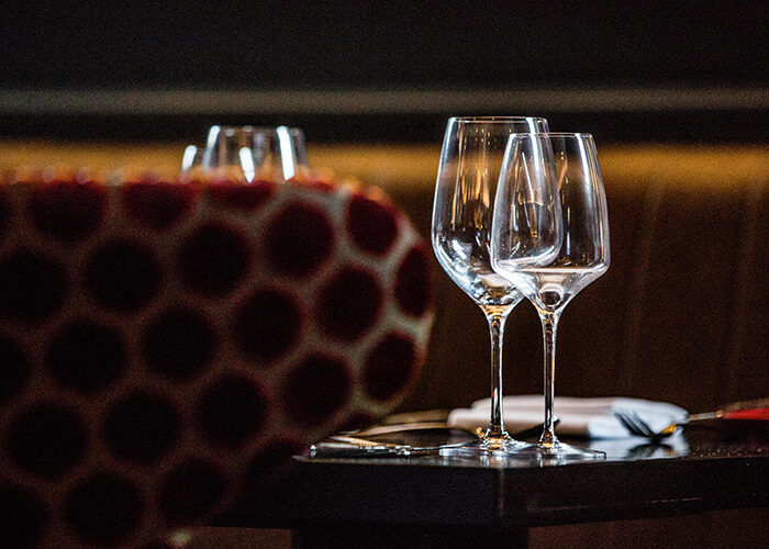 Two empty wine glasses on a table