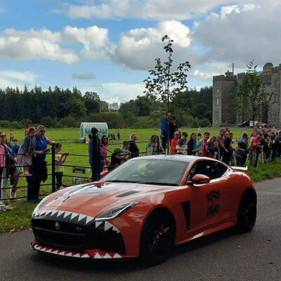 A red sports car at the cannonball event